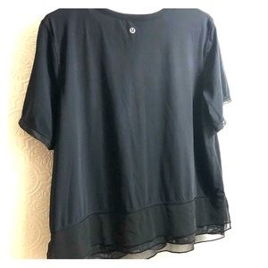Cute ruffled Lululemon workout shirt